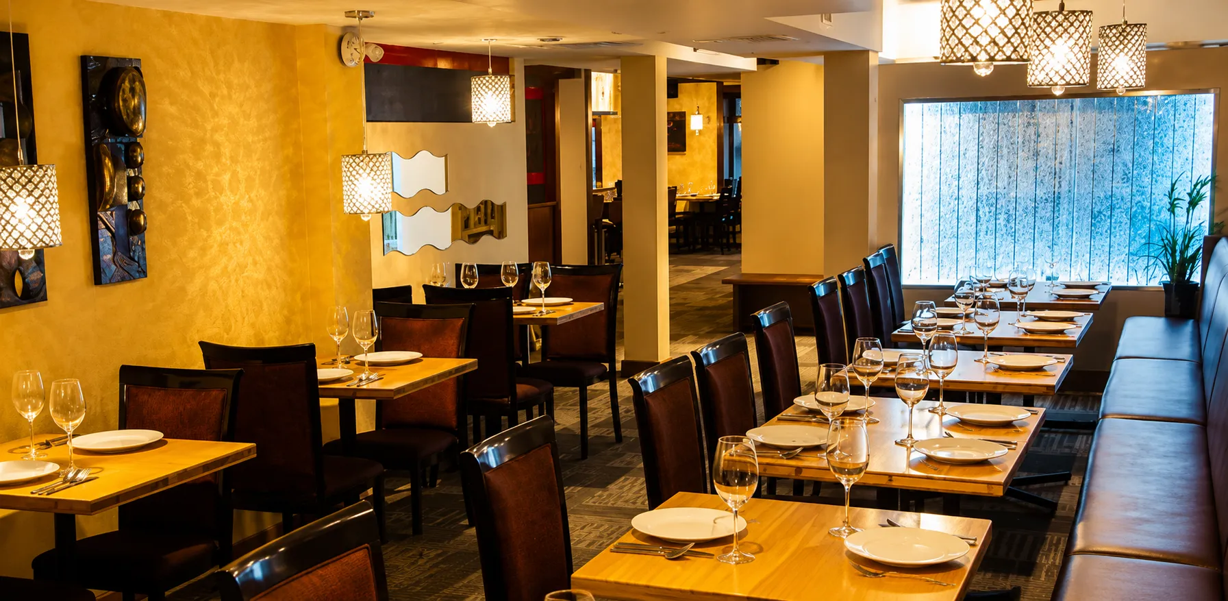 Dining room table set at Indian Curry House-Banff, the Indian restaurant serving Middle Springs in Banff, AB